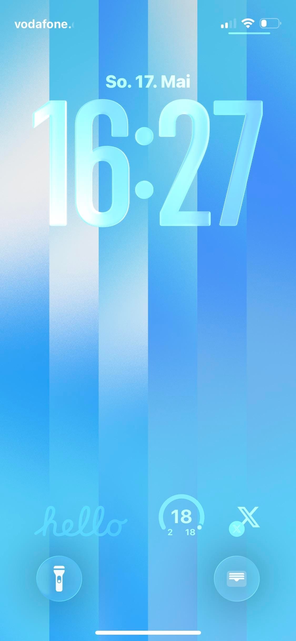 A developer iPhoner on a sky-blue stripe wallpaper