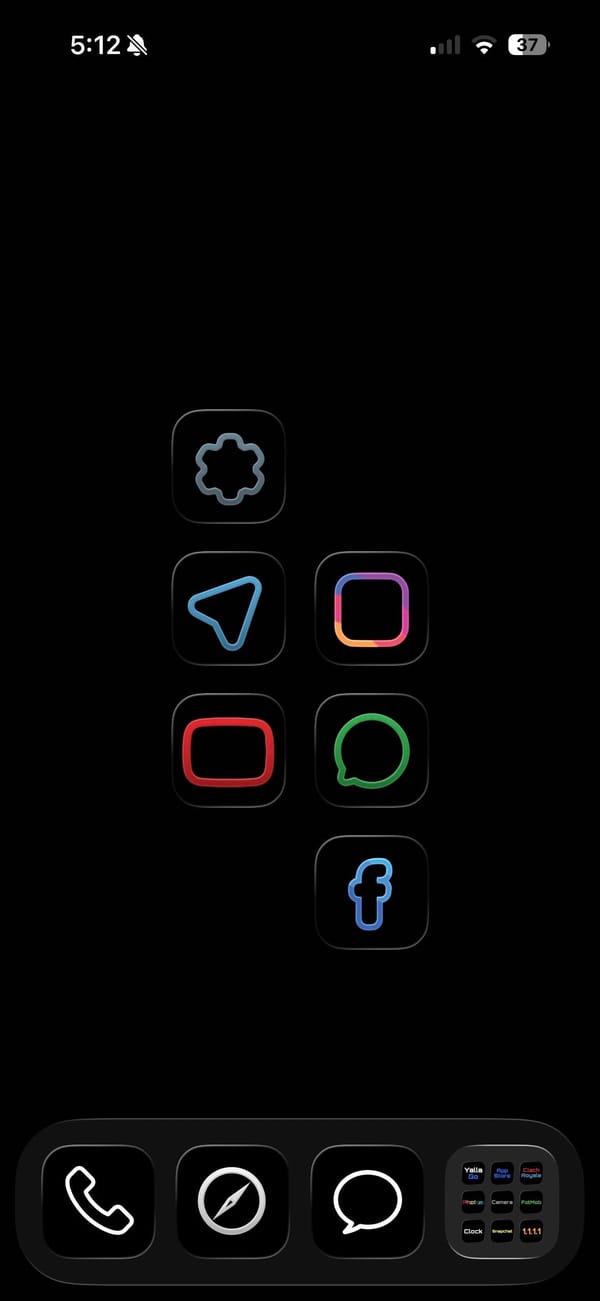 Pure-black setup with neon and word icons